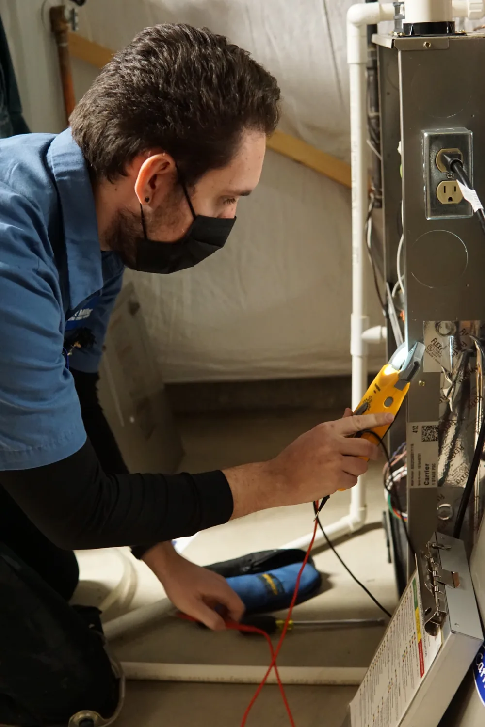 tr miller electrician performing electrical repair in a western Chicago suburban home
