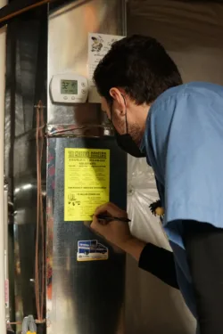 hvac technician servicing a home in the chicagoland suburbs