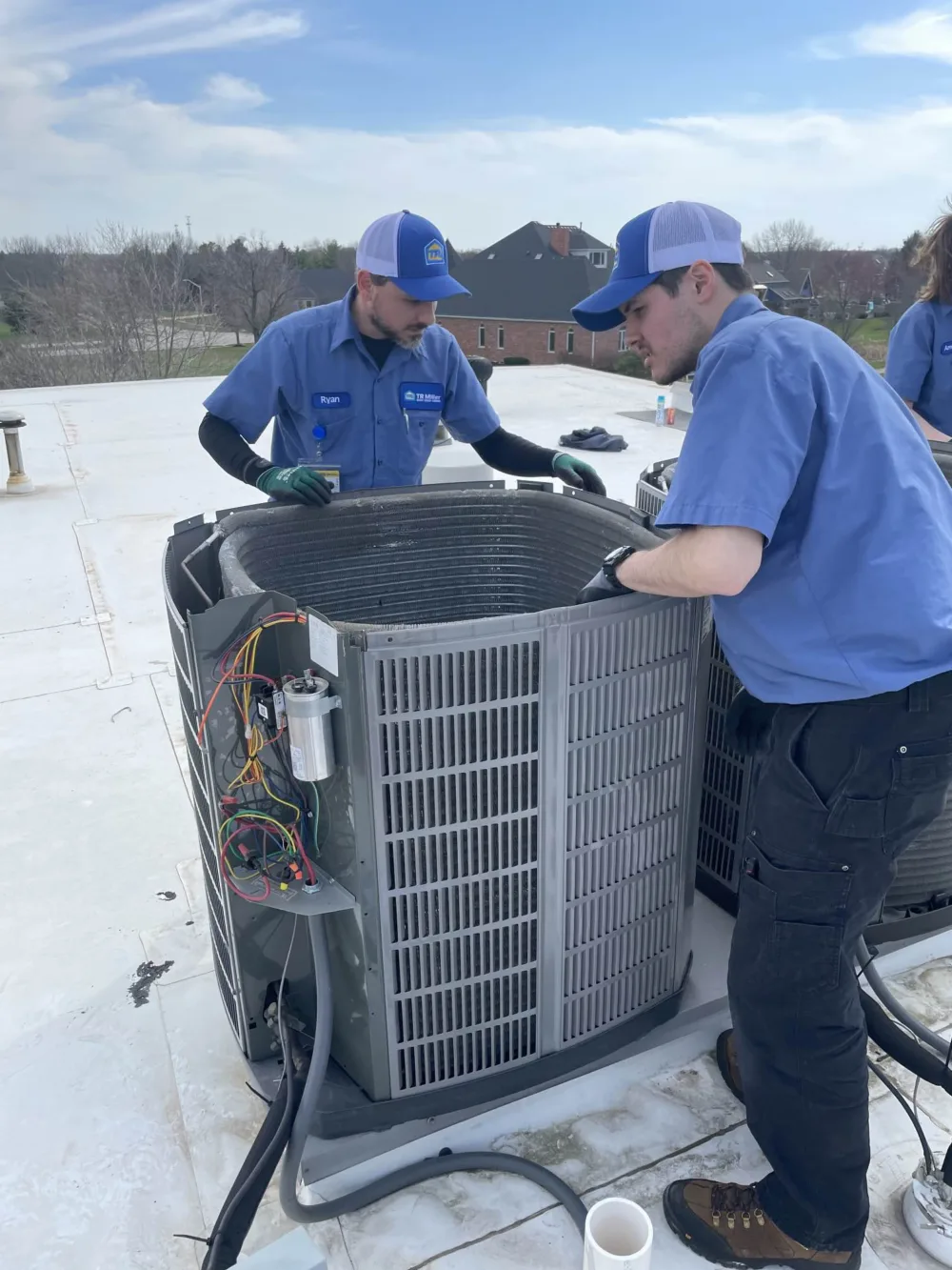 hvac technicians performing ac repair in the western chicago suburbs