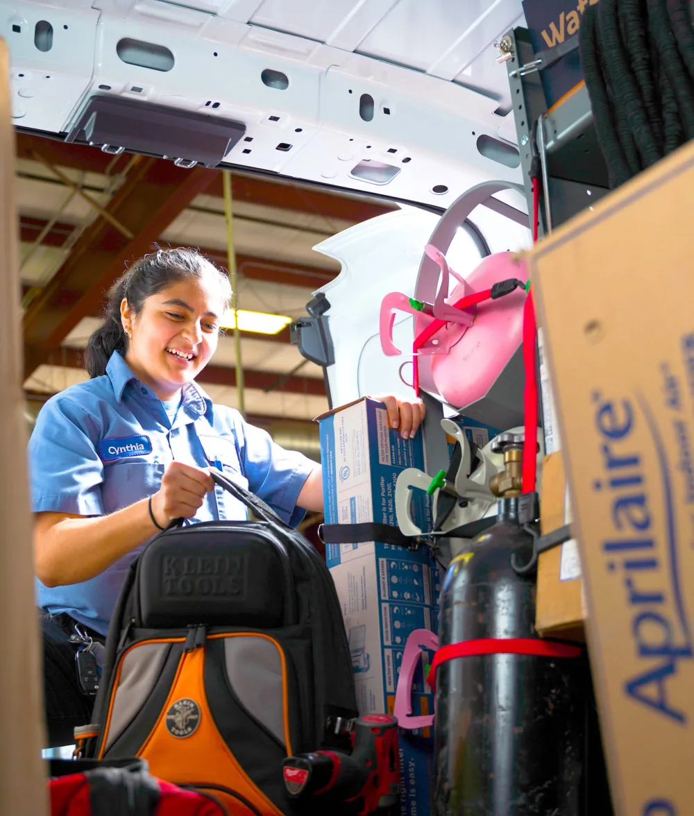 tr miller hvac technician prepping for a job in the southern chicago suburbs
