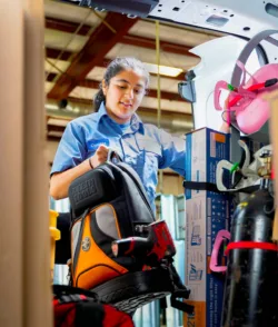 TR Miller technician preparing for an HVAC service in Western Chicago suburbs.