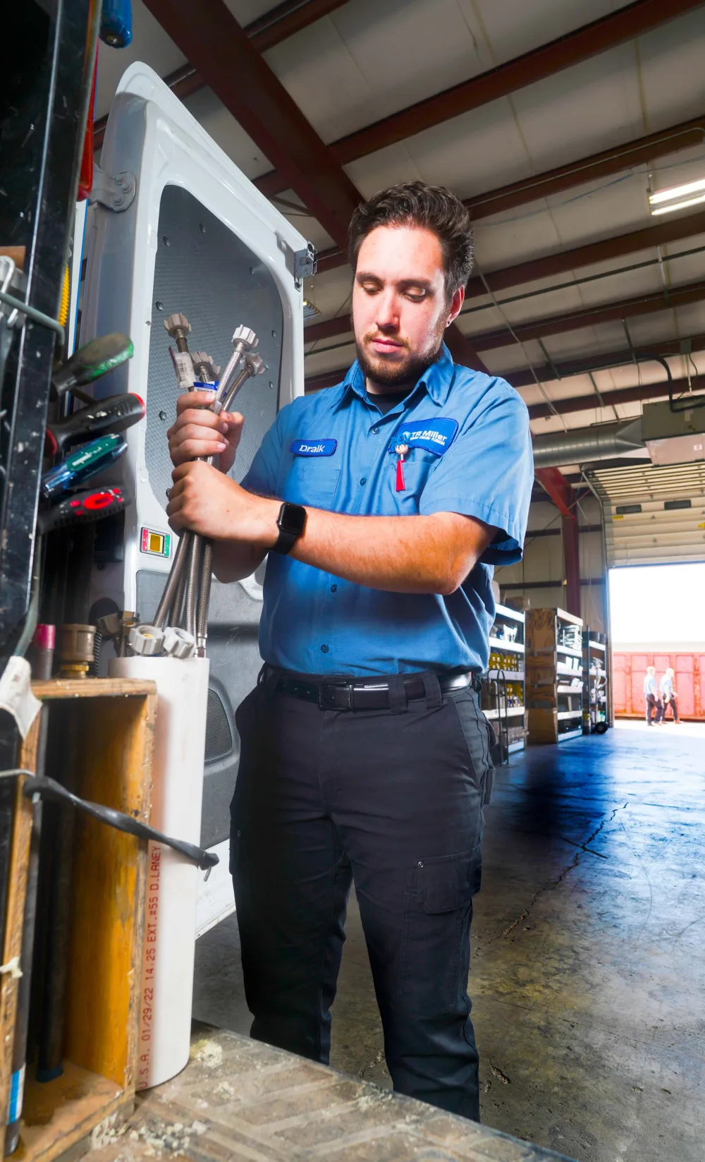 residential plumber prepping for a job in western chicago suburbs