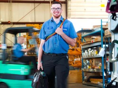 ryan laske, hvac manager, prepares to provide a furnace tune up in chicagoland suburbs
