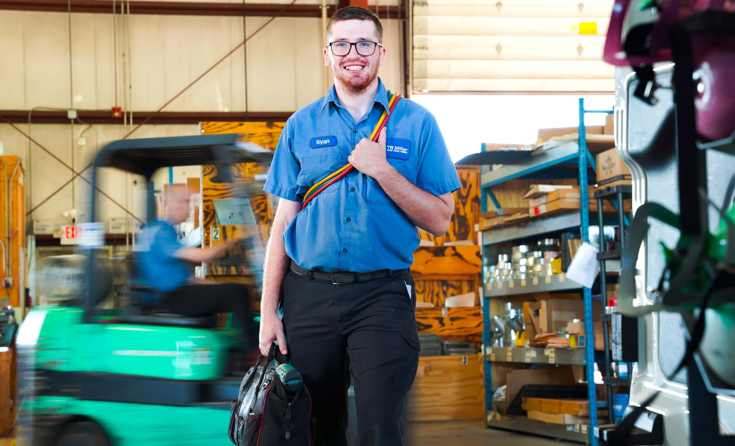 ryan laske, hvac manager, prepares to provide a furnace tune up in chicagoland suburbs
